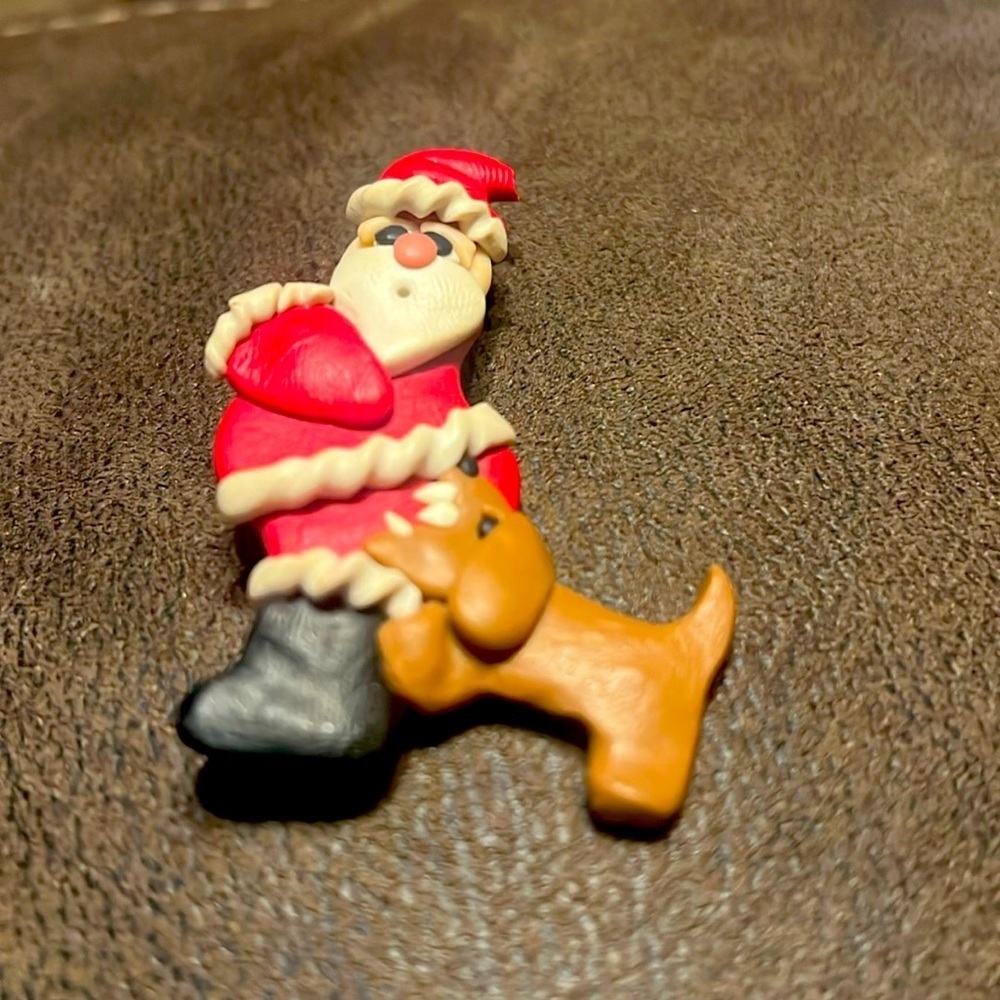 Vintage santa with dog biting brooch